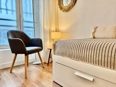 Un ou plusieurs lits dans un hébergement de l'établissement Petit Paris