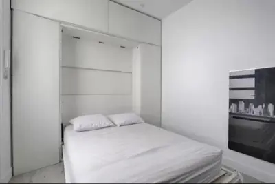Un ou plusieurs lits dans un hébergement de l'établissement Fantin Latour studio confortable 2P Seine et tour Eiffel