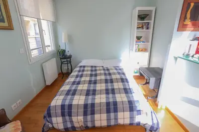 Un ou plusieurs lits dans un hébergement de l'établissement Bright pied-à-terre Eiffel Tower 4 people