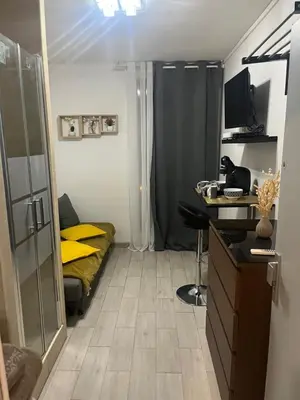 Cuisine ou kitchenette dans l'établissement Studio proche Tour Eiffel