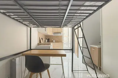 Cuisine ou kitchenette dans l'établissement Flexliving - studio - Faubourg Saint-Antoine