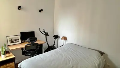 Télévision ou salle de divertissement dans l'établissement Charmant 2 pièces calme proche Paris