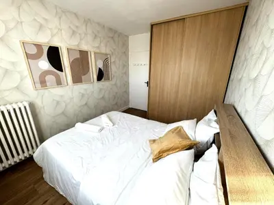 Un ou plusieurs lits dans un hébergement de l'établissement Nid douillet et convivial à Gambetta, Paris 20ème