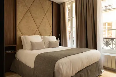 Un ou plusieurs lits dans un hébergement de l'établissement Elegant apartment - 2BR- 6P- Gare Saint Lazare