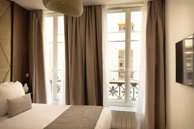 Un ou plusieurs lits dans un hébergement de l'établissement Elegant apartment - 2BR- 6P- Gare Saint Lazare
