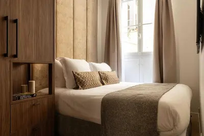 Un ou plusieurs lits dans un hébergement de l'établissement Elegant apartment - 2BR- 6P- Gare Saint Lazare