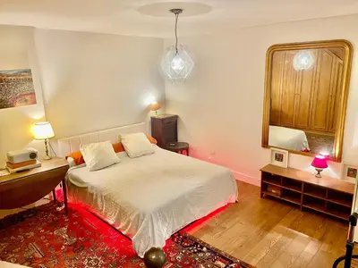 Un ou plusieurs lits dans un hébergement de l'établissement Duplex Tour Eiffel