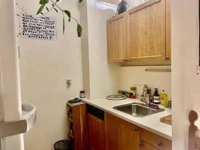 Cuisine ou kitchenette dans l'établissement Duplex Tour Eiffel
