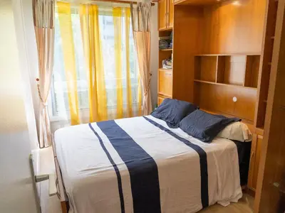Un ou plusieurs lits dans un hébergement de l'établissement Welcome chez Zouzou Paris XV