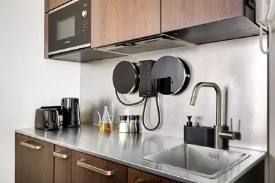 Cuisine ou kitchenette dans l'établissement La vie du marais