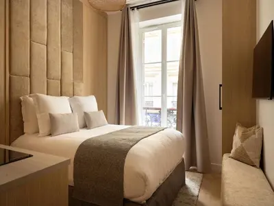 Un ou plusieurs lits dans un hébergement de l'établissement Charming Cosy Studio - 2P - Gare Saint Lazare