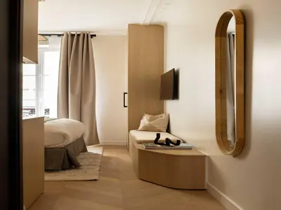 Un ou plusieurs lits dans un hébergement de l'établissement Charming Cosy Studio - 2P - Gare Saint Lazare