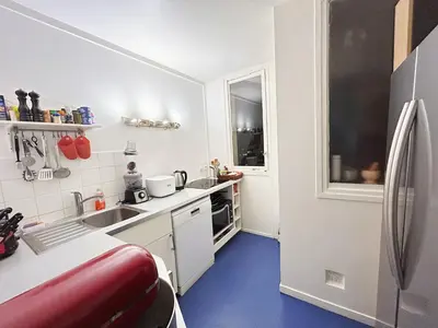 Cuisine ou kitchenette dans l'établissement EIFFEL TOWER SEINE RIVER VIEW PARIS 88 square meters