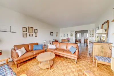 Coin salon dans l'établissement Comfort, bright and view Eiffel Tower - Levallois