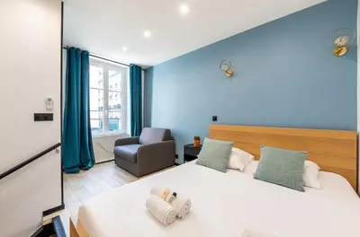 Un ou plusieurs lits dans un hébergement de l'établissement AC & Duplex Close to Eiffel Tower - 20 min Away