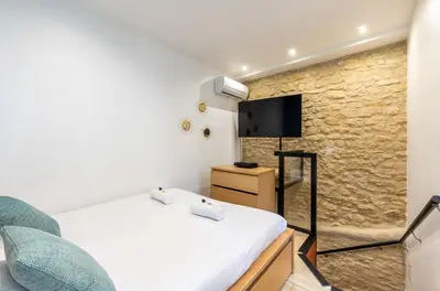 Un ou plusieurs lits dans un hébergement de l'établissement AC & Duplex Close to Eiffel Tower - 20 min Away