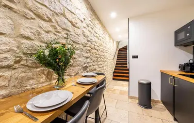 Cuisine ou kitchenette dans l'établissement AC & Duplex Close to Eiffel Tower - 20 min Away