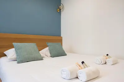 Un ou plusieurs lits dans un hébergement de l'établissement AC & Duplex Close to Eiffel Tower - 20 min Away