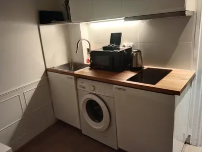 Cuisine ou kitchenette dans l'établissement Beautiful stay in Paris