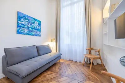Télévision ou salle de divertissement dans l'établissement Mousquetaire