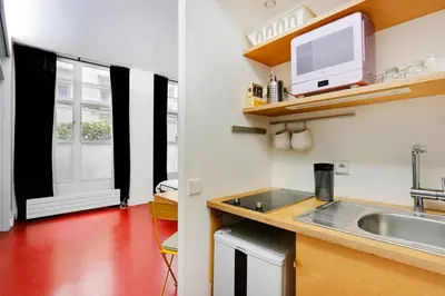 Cuisine ou kitchenette dans l'établissement Studio Louvre Opera