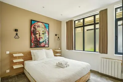 Un ou plusieurs lits dans un hébergement de l'établissement Amazing apartment - 2BR6P - Bastille