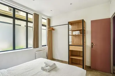 Un ou plusieurs lits dans un hébergement de l'établissement Amazing apartment - 2BR6P - Bastille