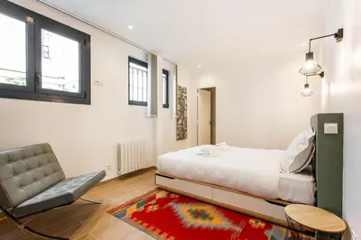 Un ou plusieurs lits dans un hébergement de l'établissement Amazing apartment - 2BR 6P - Aligre