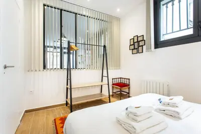Un ou plusieurs lits dans un hébergement de l'établissement Amazing apartment - 2BR 6P - Aligre