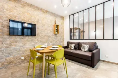 Coin salon dans l'établissement Amazing apartment - 1BR 4P - Bastille