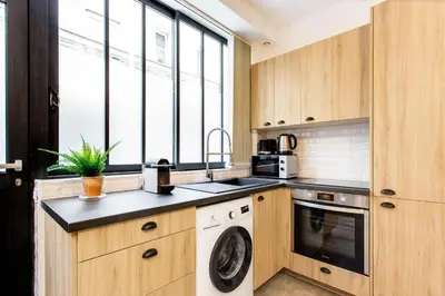Cuisine ou kitchenette dans l'établissement Amazing apartment - 1BR 4P - Bastille