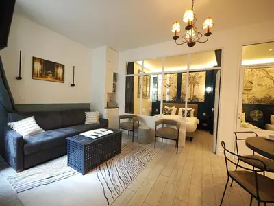 Coin salon dans l'établissement Saint Germain Elegant ChicSuites