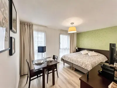 Un ou plusieurs lits dans un hébergement de l'établissement Studio de 25m2 à proximité immédiate de Paris Expo, Porte de Versailles