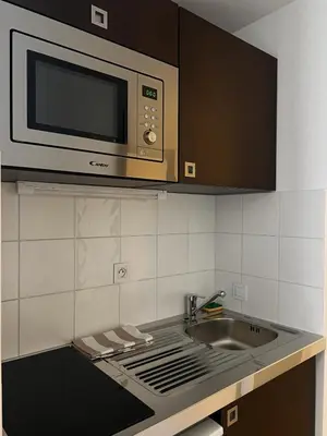 Cuisine ou kitchenette dans l'établissement Studio de 25m2 à proximité immédiate de Paris Expo, Porte de Versailles
