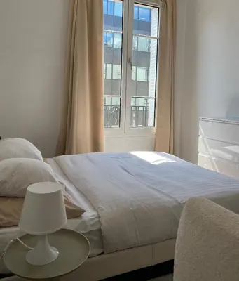 Un ou plusieurs lits dans un hébergement de l'établissement Appartement Paris Expo Porte de Versailles
