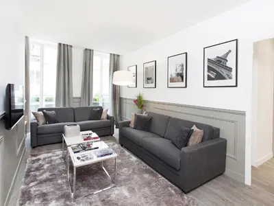 Coin salon dans l'établissement LivinParis - Luxury 3 Bedrooms Grands-Boulevards I