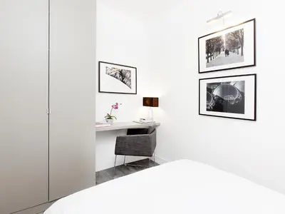 Un ou plusieurs lits dans un hébergement de l'établissement LivinParis - Luxury 3 Bedrooms Grands-Boulevards I