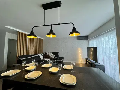 Coin salon dans l'établissement appartement spacieux
