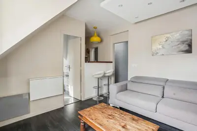 Coin salon dans l'établissement 543 Cardinet Suite - Cozy flat in Grenelle