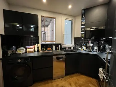 Cuisine ou kitchenette dans l'établissement Bel appartement Paris Montmartre