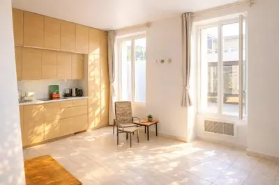 Coin salon dans l'établissement Le Passage Secret – Studio 4 pers à Paris