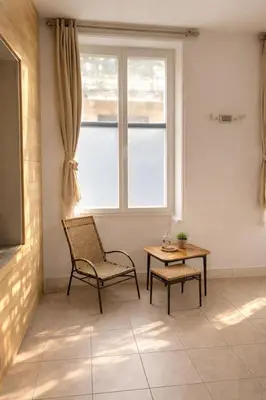Coin salon dans l'établissement Le Passage Secret – Studio 4 pers à Paris