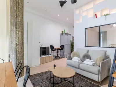Coin salon dans l'établissement Cosy apartment - 1BR 4P - Passy Tour Eiffel