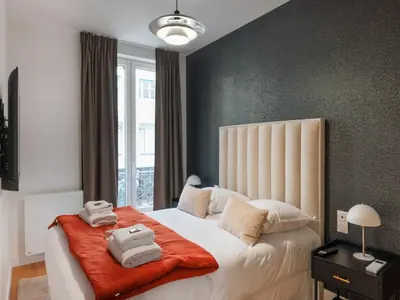 Un ou plusieurs lits dans un hébergement de l'établissement Magnificent apartment - 4BR 10P - Arc de Triomphe