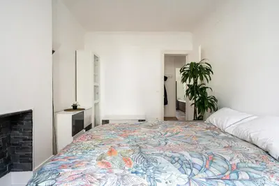 Un ou plusieurs lits dans un hébergement de l'établissement Nice and cozy parisian apartment