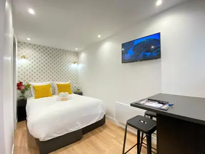 Un ou plusieurs lits dans un hébergement de l'établissement GuestReady - Charming Parisian stay in Salpêtrière