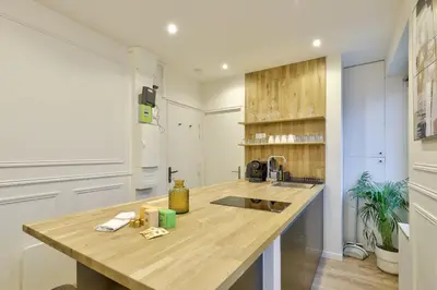 Cuisine ou kitchenette dans l'établissement GuestReady - Charming Parisian stay in Salpêtrière