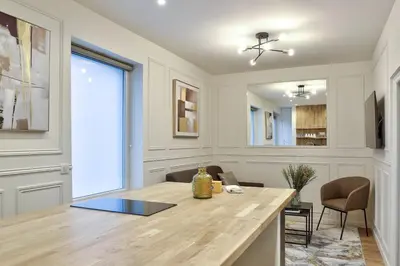 Télévision ou salle de divertissement dans l'établissement GuestReady - Charming Parisian stay in Salpêtrière
