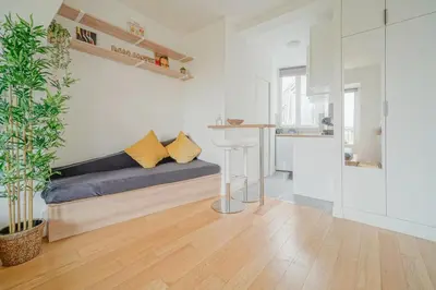 Cuisine ou kitchenette dans l'établissement Charming studio near Paris