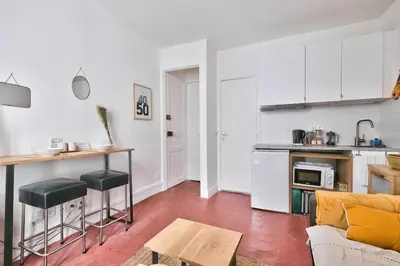 Cuisine ou kitchenette dans l'établissement Lovely Studio Place de la Bastille